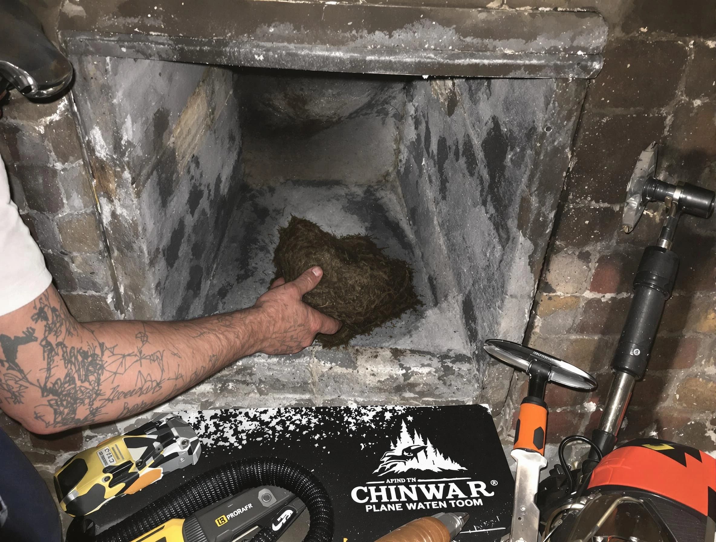 Barnegat Chimney Sweep safely removing debris and screening chimney in Barnegat, NJ